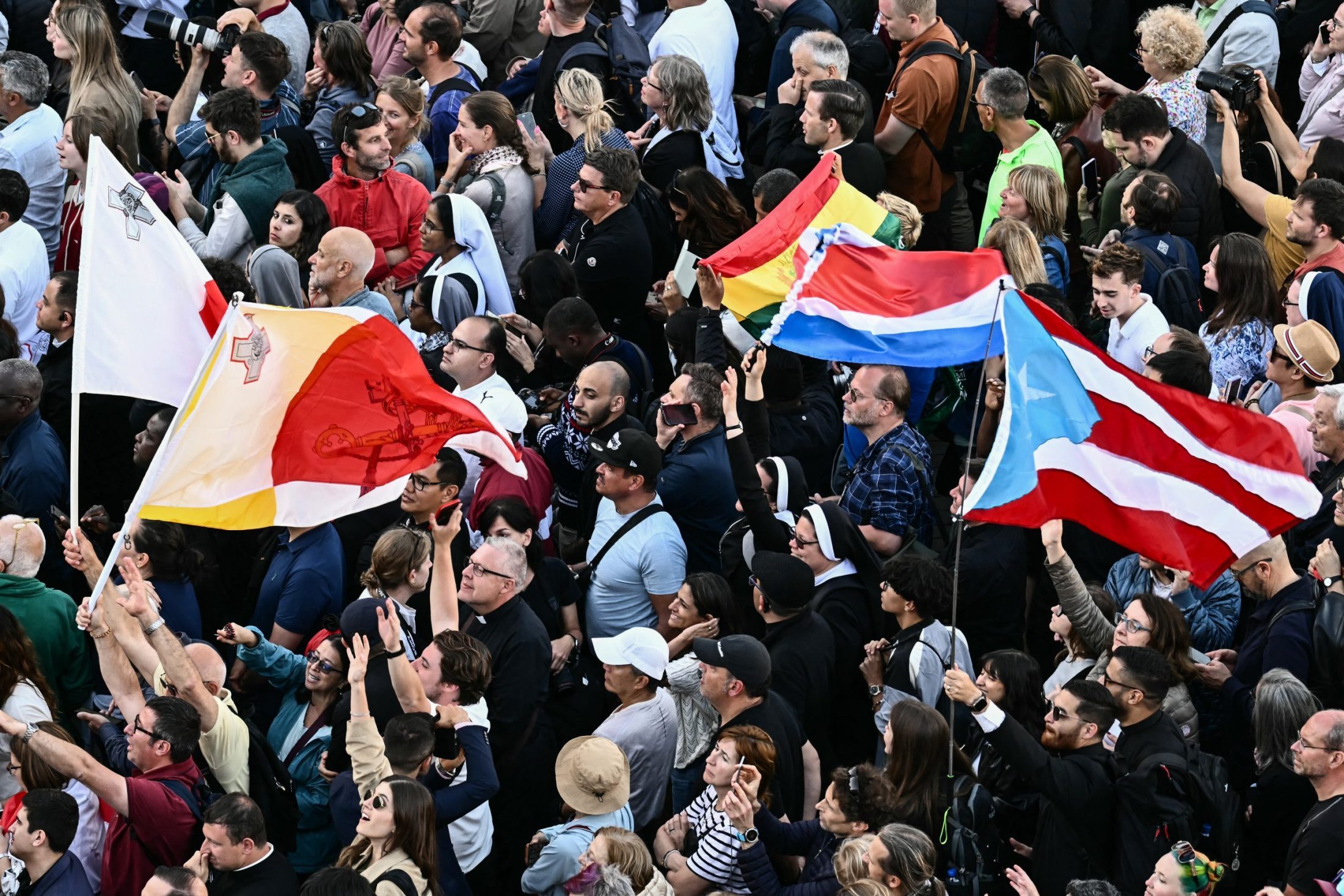 AFP__20250508__44YU6X4__v1__HighRes__VaticanReligionPopeConclave-scaled